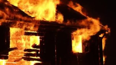 Burning house. Old wood house is burning. Fire
