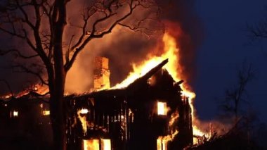 Burning house. Old wood house is burning. Fire