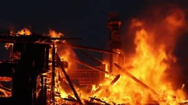 Burning house. Old wood house is burning. Fire