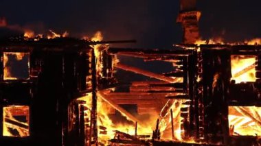 Burning house. Old wood house is burning. Fire
