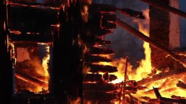 Burning house. Old wood house is burning. Fire