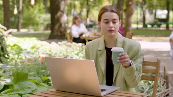 Woman Working Computer Summer Terrace Drinking Coffee Meeting Conference Takes — Stockvideo