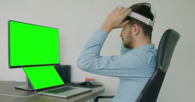 a business man wearing 3d glasses. Man fixing his glasses and preparing to analyze a project. Modern business concept