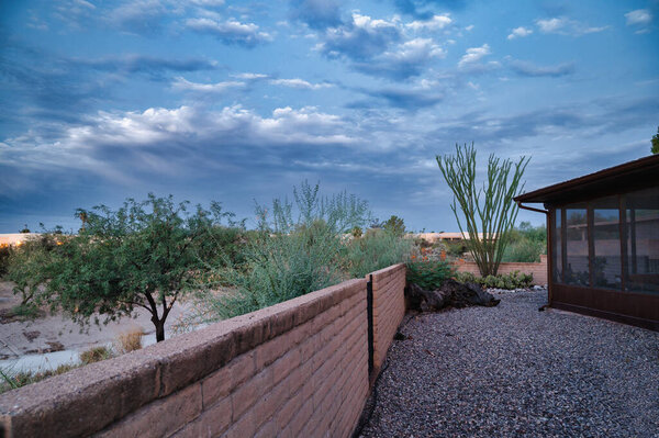 Low water use landscaping Arizona Home in Tucson. Beautiful clouds in the morning. 