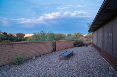 Xeriscape planting, water wise plants, landscape in Arizona backyard. 