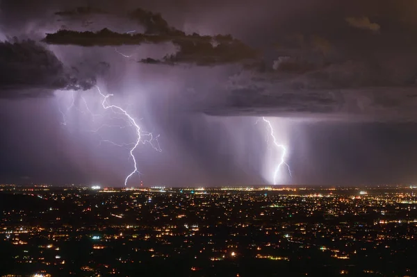 Lightning storm over Tucson, Arizona during monsoon season. Nighttime picture.