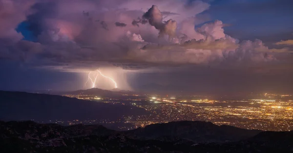 Lightning storm over Tucson, Arizona during monsoon season. Nighttime picture.