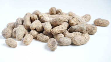 Peanuts background. close up peanuts clean isolated on white