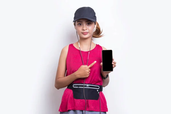 Young Asian Sporty Woman Demonstrating Mobile Phone White Background — Stock Photo, Image