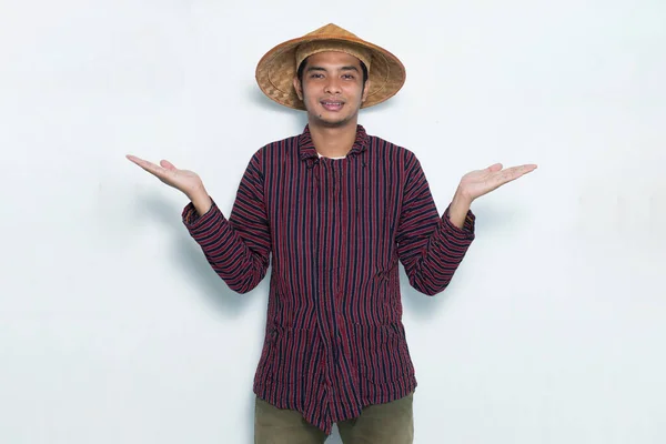 Happy Asian Farmer Pointing Fingers Different Directions Isolated White Background — Stock Photo, Image