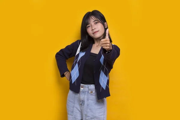 Young Asian Beautiful Woman Sign Gesture Tumb Isolated Yellow Background —  Fotos de Stock