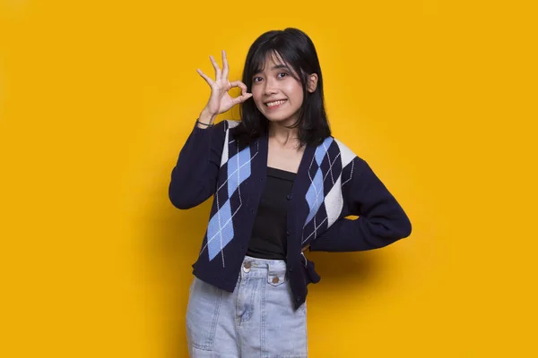 Young Asian Beautiful Woman Sign Gesture Tumb Isolated Yellow Background — Stok fotoğraf