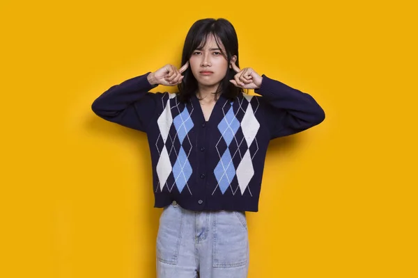 Young Asian Beautiful Woman Covering Both Ears Hands Isolated Yellow — Stock Photo, Image