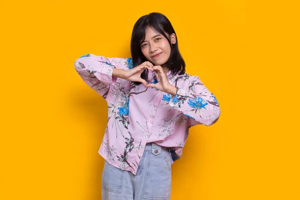 Asian Beautiful Young Woman Showing Heart Sign Love Isolated Yellow — Stock Fotó