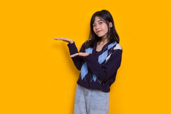 Young Asian Woman Pointing Fingers Different Directions Isolated Yellow Background —  Fotos de Stock