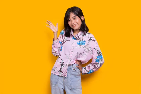Young Asian Woman Pointing Fingers Different Directions Isolated Yellow Background — Stock Fotó