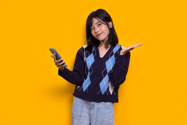 Happy Young Asian Beautiful Woman Using Mobile Phone Isolated Yellow — Stock Photo, Image