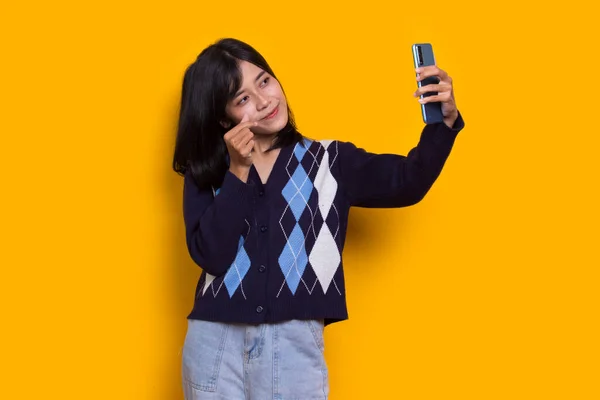 Happy Young Asian Beautiful Woman Using Mobile Phone Isolated Yellow — Fotografia de Stock