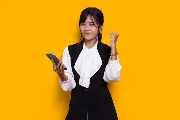 Happy Young Asian Beautiful Woman Using Mobile Phone Isolated Yellow — Stock Fotó