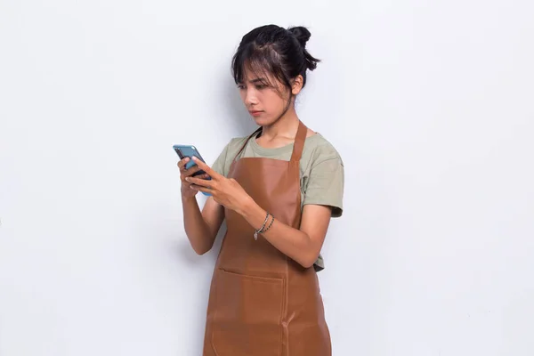 Happy Young Asian Barista Waitress Using Mobile Smartphone Isolated White — Stock fotografie