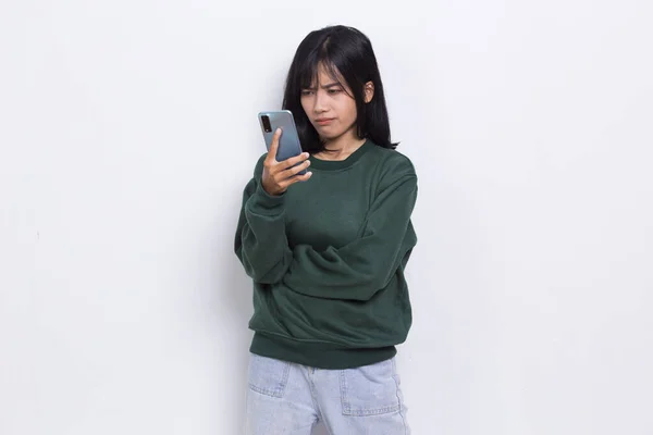 Mad Shock Young Asian Beautiful Woman Using Mobile Phone Isolated — Stok fotoğraf