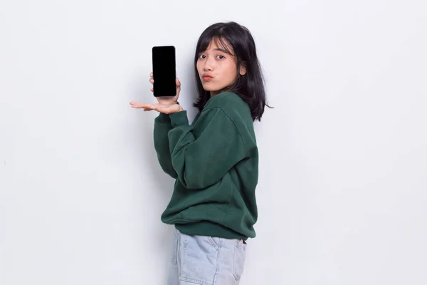 Young Beautiful Asian Cute Woman Demonstrating Mobile Cell Phone Isolated — Stock Fotó
