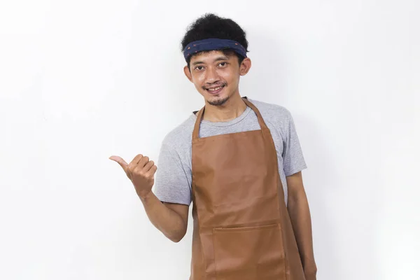 Happy Asian Man Barista Waitress Pointing Fingers Different Directions Isolated — Stockfoto