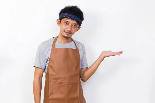 Happy Asian Man Barista Waitress Pointing Fingers Different Directions Isolated — Stockfoto