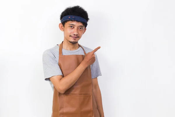 Happy Asian Man Barista Waitress Pointing Fingers Different Directions Isolated — Stock fotografie