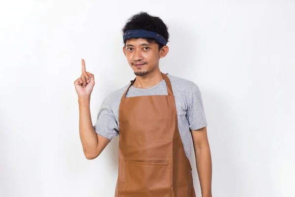 Happy Asian Man Barista Waitress Pointing Fingers Different Directions Isolated — Stock fotografie