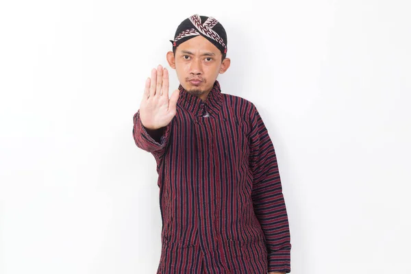 Asian Man Javanese Traditional Cloth Lurik Open Hand Doing Stop — Fotografia de Stock