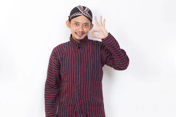 Asian Man Javanese Traditional Cloth Lurik Sign Gesture Tumb Isolated — Stockfoto