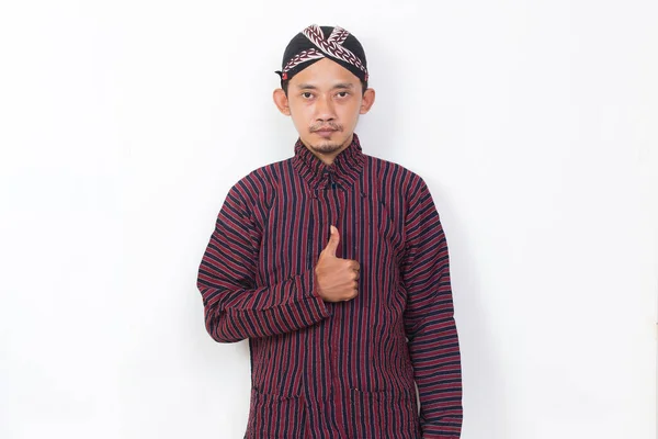 Asian Man Javanese Traditional Cloth Lurik Sign Gesture Tumb Isolated — Foto de Stock