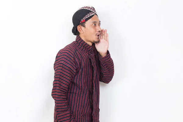 Asian Man Javanese Traditional Cloth Lurik Shouting Yelling Announcing Isolated — Stok Foto