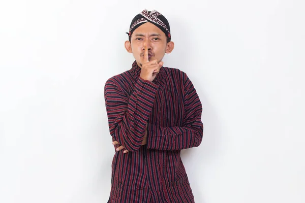 Asian Man Javanese Traditional Cloth Lurik Telling Secret Rumor Isolated — Stock Fotó