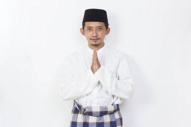asian muslim man portrait welcoming guests gretting isolated on white background