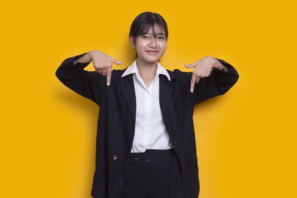 Young Asian Woman Pointing Fingers Different Directions Isolated Yellow Background — Fotografia de Stock