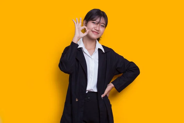 Young Asian Beautiful Woman Sign Gesture Tumb Isolated Yellow Background — Stock Photo, Image