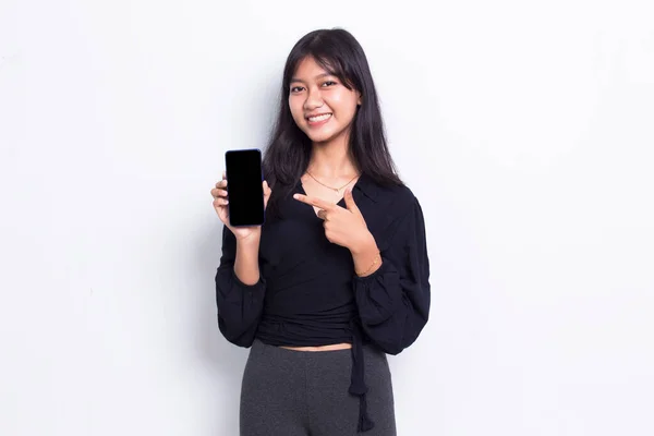 Young Beautiful Asian Cute Woman Demonstrating Mobile Cell Phone Isolated — Stok fotoğraf