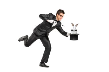 Magician holding top hat with rabbit clipart