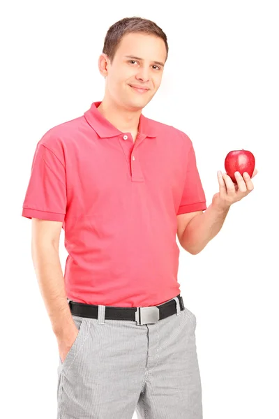 Hombre sosteniendo una manzana —  Fotos de Stock