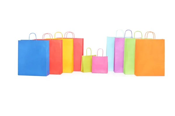 Sacos de compras coloridos na mesa — Fotografia de Stock