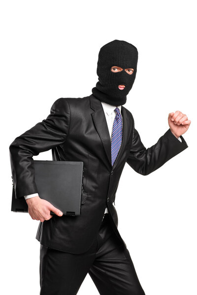 Hacker running with laptop