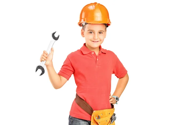 Niño con llave de sujeción de casco —  Fotos de Stock