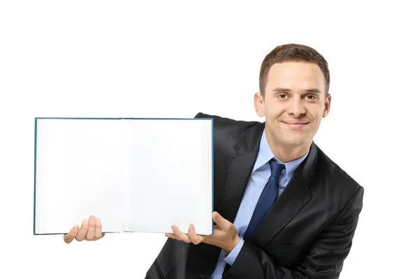 Businessman showing a white blank book — Stock Photo, Image