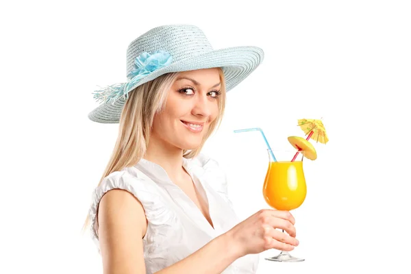 Blond woman holding an exotic cocktail — Stock Photo, Image