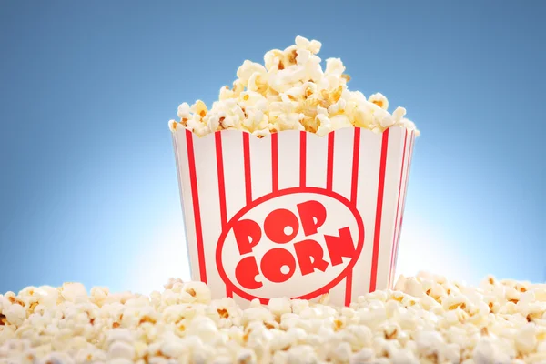 Popcorn in box overflowing — Stock Photo, Image