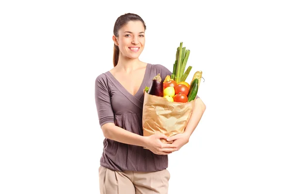 Female holding paper bag — Stock Photo, Image