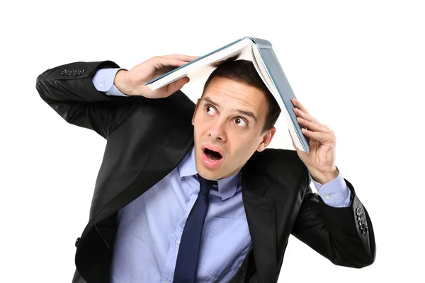 Man covering head with book — Stock Photo, Image