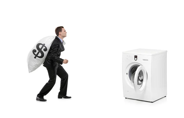 Man met geld tas — Stockfoto